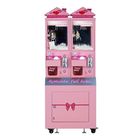 Rosa Spielzeug-Kran-Maschine, romantisches volles Haus-Luxusboutiquen-Minispielzeug-anziehende Maschine